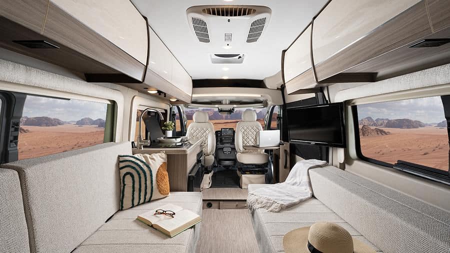 <p>The Entegra Coach Ethos is a modern, luxurious camper van featuring a big couch that turns into a sleeping area, a wet bath, and a dining area. The guys at Entegra Coach designed a smaller kitchen to allow for a more extensive sleeping area – an excellent decision!</p><p>If you like, you can add a pop-top roof to the Ethos to create a second bedroom.</p>