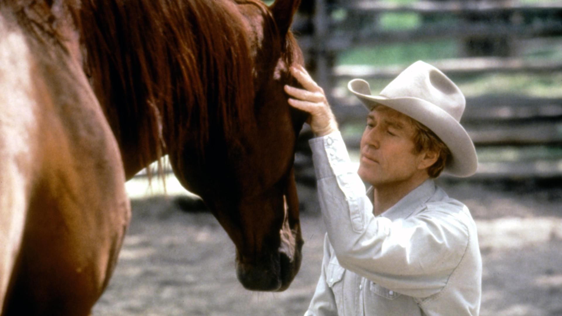 <p>                     Fans of Robert Redford – and horses – will love this adventure/romance that deals with the themes of trauma and love in an exciting equestrian drama.                   </p>                                      <p>                     Teenager Grace MacLean (Scarlett Johansson) is hit by a truck while out horse-riding. To help heal her troubled and injured daughter and horse, the mother, Annie MacLean (Dame Kristin Scott Thomas), takes them to Montana to recuperate at the ranch of  “horse whisperer” Tom Booker (Robert Redford).                   </p>