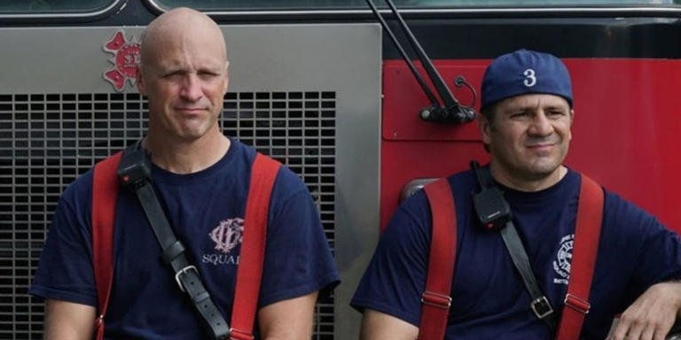 Randy Flagler as Harold Capp sits against a fire truck with Anthony Ferraris as Tony Ferraris on Chicago Fire