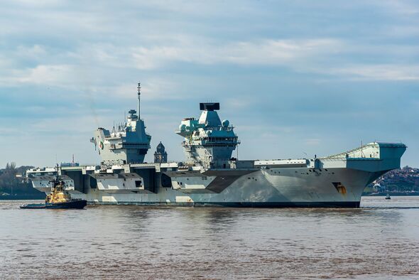 royal navy's largest ship - 65,000 tonne beast with five gyms and can carry 40 planes