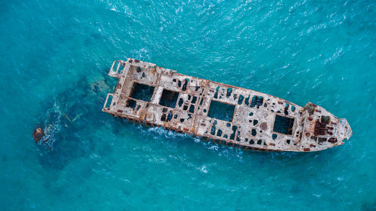 shipwreck in turquoise waterss