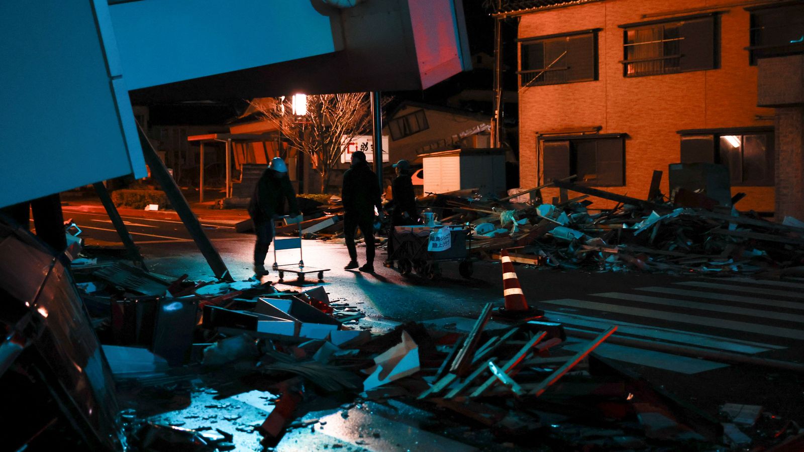 at least 126 confirmed dead after japan earthquake - as tremors and snow threaten to collapse roads