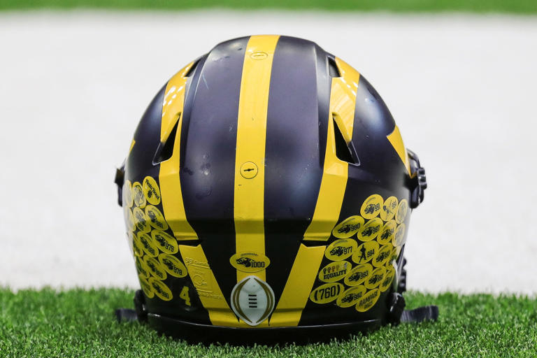 Michigan helmet stickers, explained: Why Wolverines players have decals ...