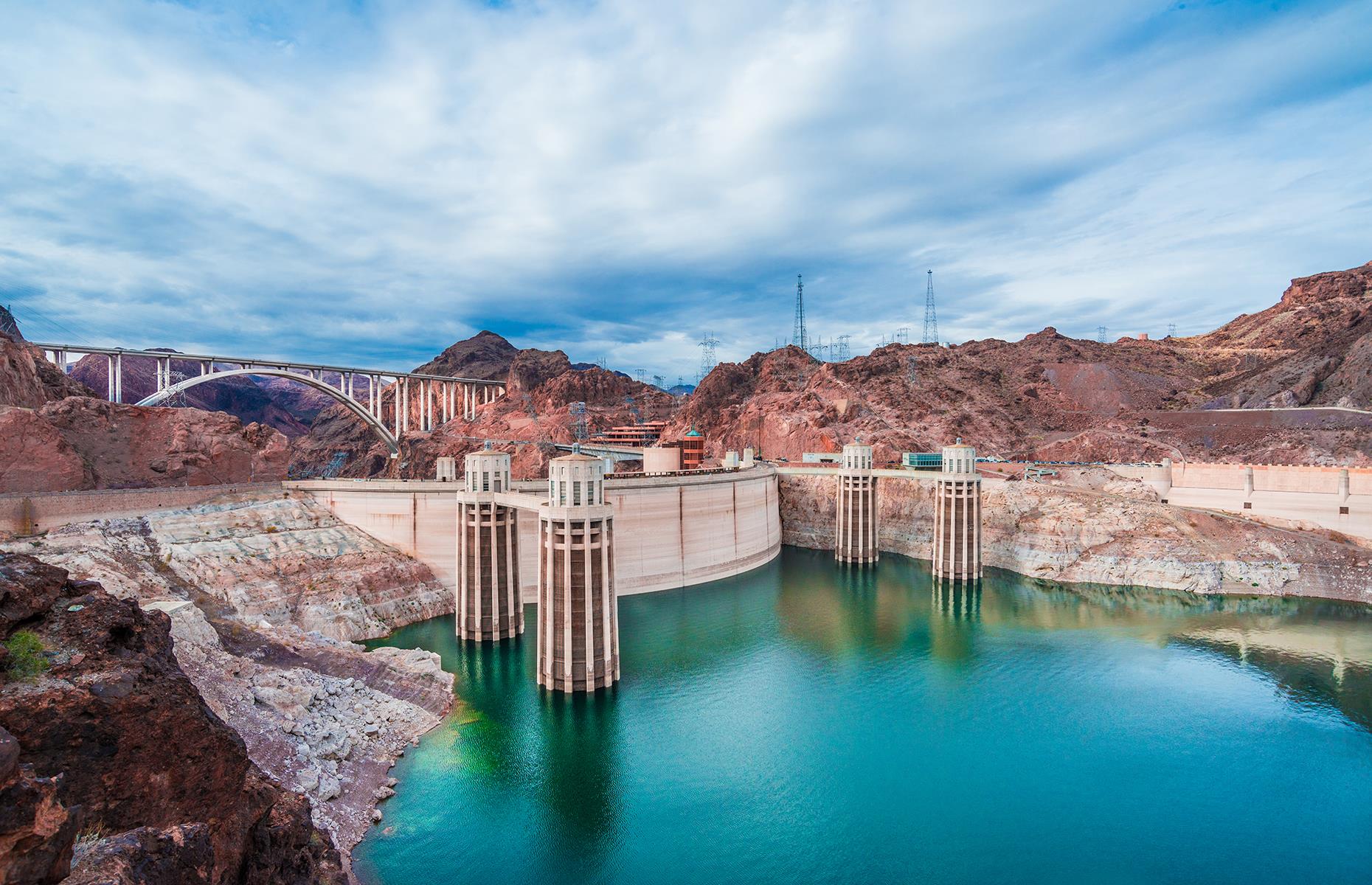 <p>One of the most impressive feats of engineering in the US, the Hoover Dam was completed in 1935 to save the local farmlands from frequent flooding and supply the surrounding states with electricity. Situated around 30 miles from the neon lights of Las Vegas, the dam is a marvel to see in real life. <a href="https://www.usbr.gov/lc/hooverdam/service/index.html">Guided tours</a> offer an up close and personal view of the mighty structure, giving access to the historic tunnels and original elevators, the inspection tunnels at the center of the dam, and views through the inspection ventilation shaft. Tickets are $30 and are available to buy on-site only.</p>