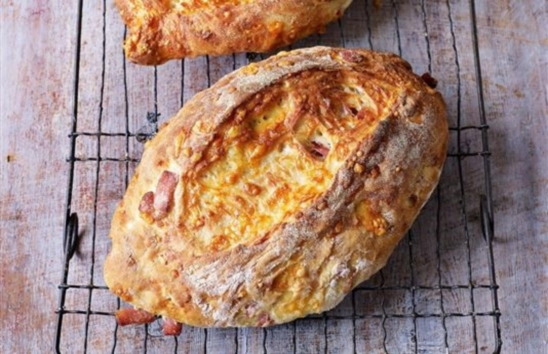 <p>This might be a straightforward-looking loaf, but the wow factor comes from its filling of smoked bacon and melted cheese. The recipe makes four small breads, so serve one warm and freeze the others for another day. Allow to thaw for an hour, then flash in a hot oven for five minutes to heat through.</p>  <p><a href="https://www.lovefood.com/recipes/59672/bacon-and-cheddar-loaves-recipe"><strong>Get the recipe for bacon and Cheddar loaves here</strong></a></p>