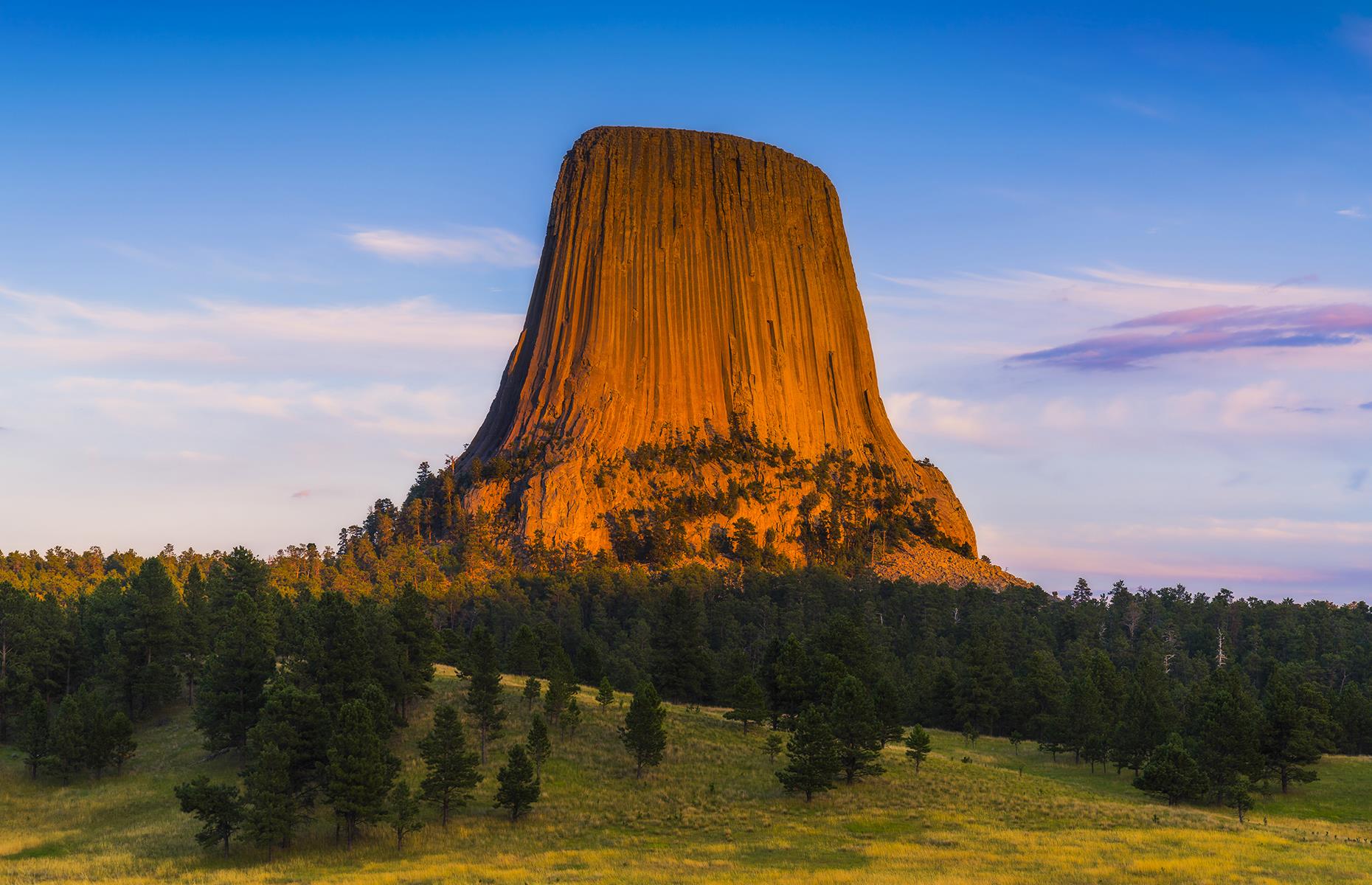 <p>Standing watch over Wyoming’s sprawling northeastern prairies, Devils Tower is a remarkable sight. Sacred to many Indigenous peoples, the geological wonder was formed from molten rock over millions of years and rises some 867 feet from its base to its flat summit – that makes it the largest example of columnar jointing in the world. It became America’s first National Monument way back in 1906.</p>  <p><a href="https://www.loveexploring.com/galleries/94776/99-beautiful-things-we-love-about-america?page=1"><strong>Now take a look at 99 beautiful things we love about America</strong></a></p>