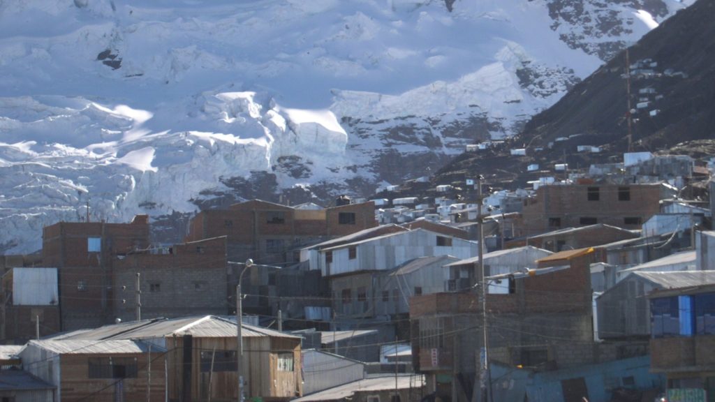 <p>This little town can be found three miles up in the mountainous province of Puno, Peru, right next to a gold mine. It is noted as being the highest city in the world, and it is also one of the most poverty stricken, with the majority of its residents living below the poverty line.</p><p>It lacks many basic amenities such as running water and a sewer system, yet is still home to close to 30,000 people. To reach the city you will have to brave a 6 hour ride on unpaved rugged roads, most likely in the back of a local's old beat up truck, there are no bus routes or transit services that go to La Rinconada. Isolated is an understatement.</p>