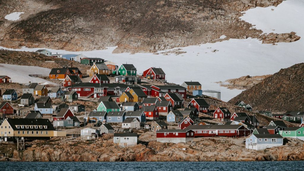 <p>This quaint little town in Greenland called Ittoqqortoormiit is home to 450 residents. So remote that in order to visit you will need to catch a ride on a helicopter.</p><p>Those that live there enjoy an array of activities including camping, watching the northern lights,dog sledding, and hiking the tundra. Despite its icy existence it is a true wonder of the world and a bucket list destination for many.</p>