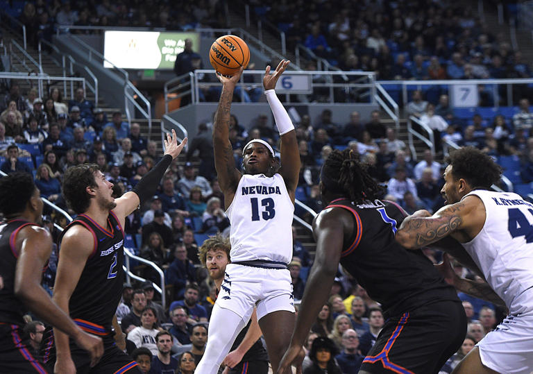 Wolf Pack shocks No. 22 Utah State on the road, 77-63