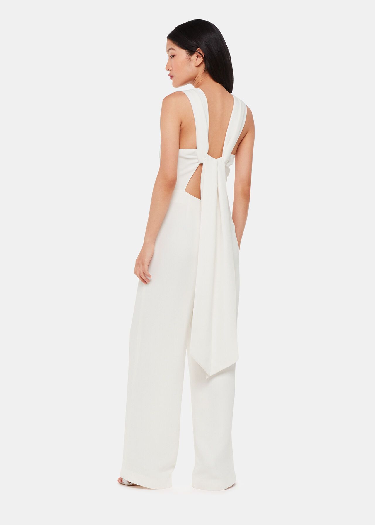 <p><strong>£399.00</strong></p><p><a href="https://www.whistles.com/product/tie-back-bridal-jumpsuit-34389.html">Shop Now</a></p><p>If you haven't already checked out Whistles' fire wedding collection what are you waiting for, ladies? We think this gorge tie-back jumpsuit is perfect for contemporary brides – although the high neckline and wide-leg silhouette means it can defs be styled for church weddings, too. </p>