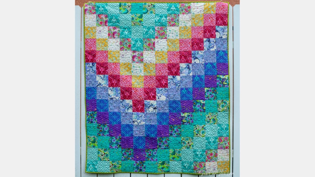 <p>The <a href="https://sewcanshe.com/sew-a-color-by-number-quilt/" rel="noreferrer noopener">Color by Number free quilt pattern</a> is a simple bargello quilt. It may look like it takes a long time to sew all those patchwork squares together, but you can do it very quickly! It is done by cutting the strips, sewing them together, and cutting and sewing again. This quilt is fat-quarter-friendly, too.</p>