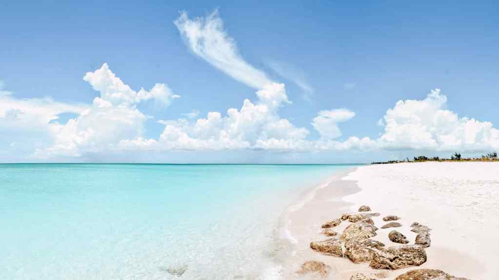 <p>Turks and Caicos is a celebrity favorite: several A-list stars own homes here. Book a flight here if you’re all about glossy interiors, white sand beaches, and refined food. Parrot Cay is the best-known part, from which you can head out wildlife spotting among a multitude of little outcrops. </p><p class="has-text-align-center has-medium-font-size">Read more: <a href="https://worldwildschooling.com/best-greek-islands-for-beaches/">Best Island Beaches in Greece</a></p>