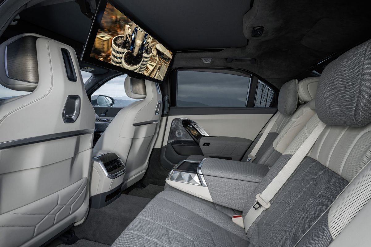 <p>BMW's full-sized luxury flagship does not disappoint when it comes to amenities. The <a href="https://www.roadandtrack.com/news/a39703162/2023-bmw-x7/">BMW 7 Series</a> features premium Bowers & Wilkins Surround Sound System, curved hepatic displays, and open pore matte wood among other delights. The multifunctioning and massaging leather seats allow the backseat to recline for the most comfortable ride. The ‘My Modes’ allows you to choose your ambiance depending on your mood.</p>