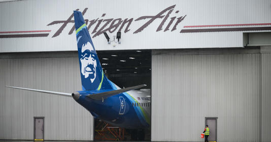 Alaska Airlines N704AL is seen grounded in a hangar at Portland International Airport in Portland, Oregon, on Jan. 9, 2024.