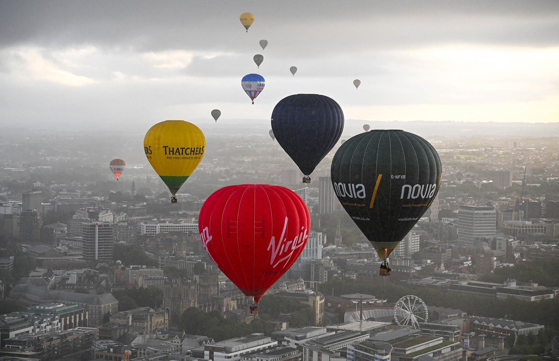 <p>Europe's largest hot air balloon event sees more than 130 of these inflatables take to the skies over Bristol – pictured here is 2023's ascent, celebrating 45 years of the festival. Launching at dusk and dawn from Ashton Court Estate's beautiful grounds, the balloons glide over the city and the famous Clifton Suspension Bridge. The free event is an incredible spectacle and attracts hundreds of thousands of spectators each year, but if you want to take to the skies in a balloon, you'll have to pay handsomely.</p>  <p><strong><a href="https://www.loveexploring.com/galleries/81954/54-of-the-worlds-most-incredible-photos-from-above?page=1">Now discover 54 of the world's most incredible photos taken from above</a></strong></p>