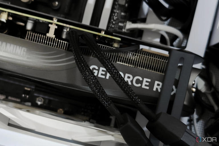 An image showing a Zotac Gaming GeForce RTX 4070 Super Trinity Black Edition GPU installed on a computer.power.