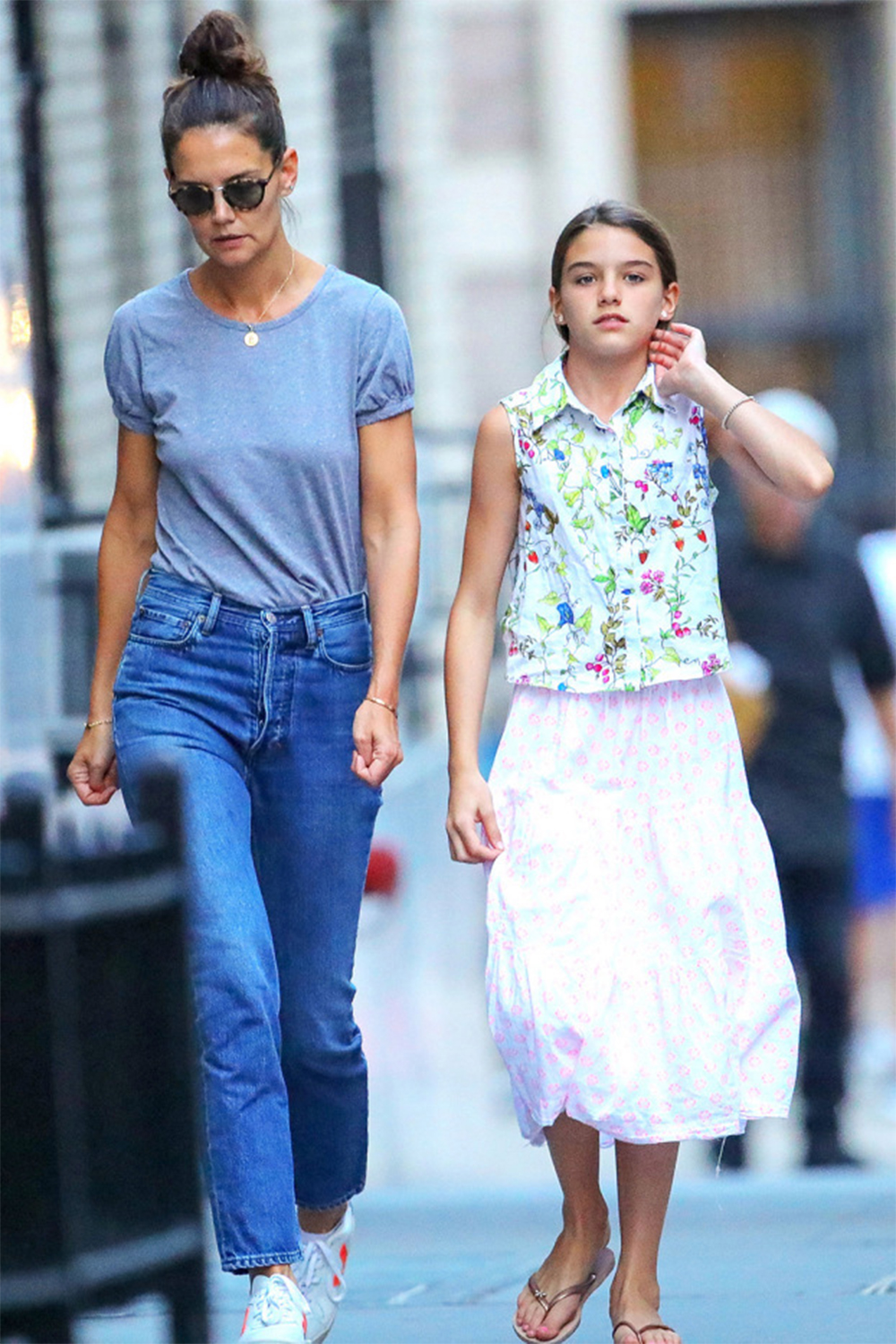 <p>Katie Holmes and Suri Cruise were spotted taking a walk through New York City. The pair looked like they were wearing their summer time best! </p>