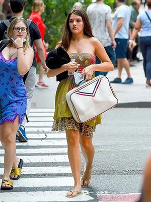 Suri Cruise is 18! See how the daughter of Tom Cruise & Katie Holmes has grown up over the years in these photos.  Full-fledged adult! Suri Cruise has truly grown up right before our very own eyes. The daughter of Tom Cruise and Katie Holmes, born April 18 2006, is a full blown teenager taking on New York City. But before Suri was joining her pals on coffee runs and doing errands through the Big Apple solo, she was just a tiny tot who happens to be the daughter of two of the most famous people on the planet. Both Tom and Katie did their best to give Suri a normal life while also keeping things private. After the pair’s divorce, Suri spent a lot of time with her mom and the pair have been living in NYC. Over the years, fans have gotten to see Suri go from tiny tot, to little girl, and now a teenager. Suri is often seen on long walks through the city with her mom. What’s most uncanny is just how much the pair look alike! To see more pictures of Suri’s transformation, click through the gallery!