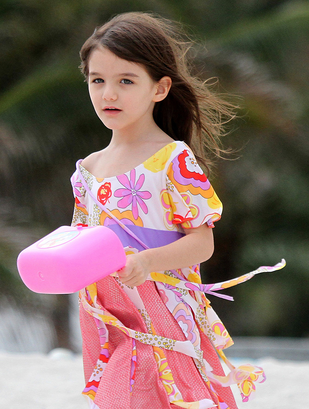 <p>Suri Cruise has fun on the beach in June 2011. Her mom was with her as they enjoyed the sun and sand. </p>