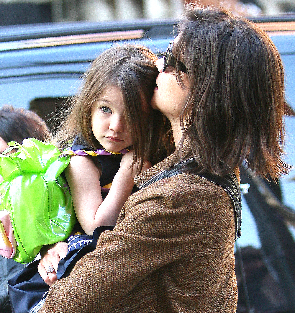 <p>Katie Holmes takes Suri to Complexions Contemporary Ballet at the Joyce Theater in New York on November 22, 2009. Suri was carried in her doting mom’s’ arms. </p>