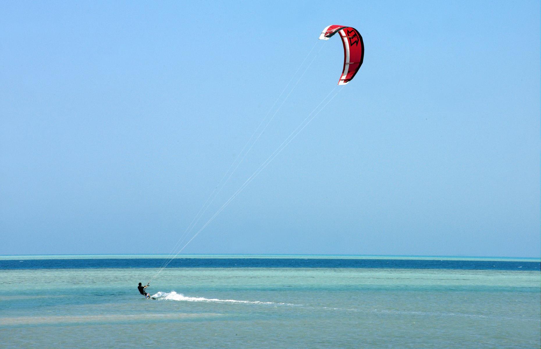 <p>Many coastal areas attract kitesurfers, but the conditions in El Gouna – with just enough wind to power the kite, yet relatively flat waters to allow the board to glide smoothly – are perfect. You need to register with a kitesurfing center, whether you’re a beginner or a pro – try Kite El Gouna on Mangroovy Beach, which is considered one of the best spots here for kitesurfing and other wind-powered watersports like parasailing.</p>