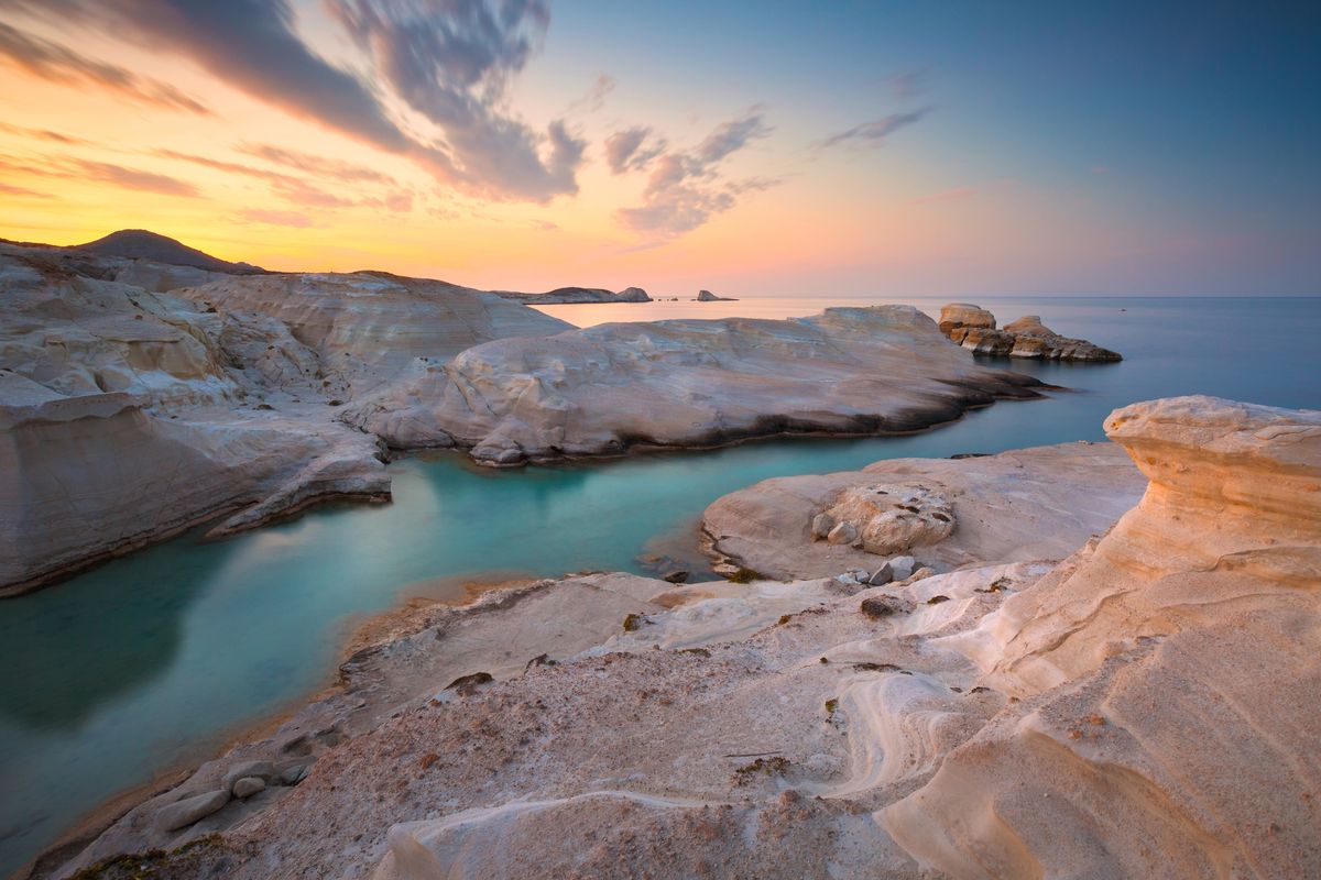 <p>Sarakiniko is a surreal lunar landscape of white volcanic rock contrasting with the deep blue of the Aegean. It’s a solid 10 on the rugged-otherworldly-beauty-o-meter.</p><p><a class="body-btn-link" href="https://go.redirectingat.com?id=74968X1553576&url=https%3A%2F%2Fwww.tripadvisor.com%2FAttraction_Review-g494953-d2171292-Reviews-Sarakiniko_Beach-Milos_Cyclades_South_Aegean.html&sref=https%3A%2F%2Fwww.elledecor.com%2Flife-culture%2Ftravel%2Fg60369620%2Fbest-beaches-greece-guide%2F">Shop Now</a></p>