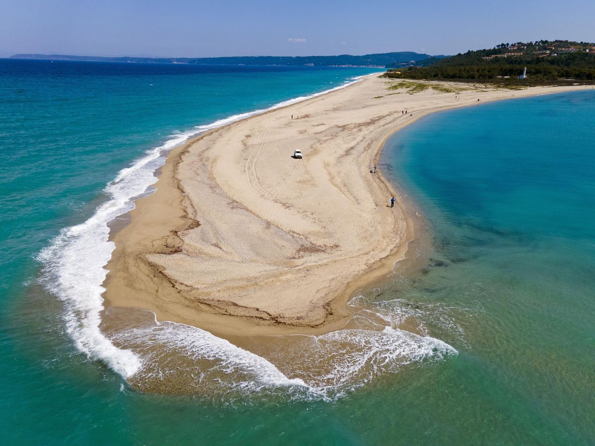 <p>When the Aegean Sea gives you the finger, you should be happy. Possidi Cape in Halkidiki is a digit-shaped stretch of seemingly untouched coastline, perfect for beachgoers seeking just a little more solitude than usual.</p><p><a class="body-btn-link" href="https://go.redirectingat.com?id=74968X1553576&url=https%3A%2F%2Fwww.tripadvisor.com%2FAttraction_Review-g667130-d12937948-Reviews-Possidi_Cape-Possidi_Kassandra_Halkidiki_Region_Central_Macedonia.html&sref=https%3A%2F%2Fwww.elledecor.com%2Flife-culture%2Ftravel%2Fg60369620%2Fbest-beaches-greece-guide%2F">Shop Now</a></p>