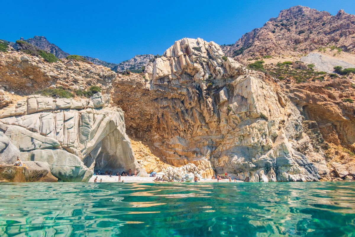 <p>It turns out that the Seychelles are closer than Expedia might have you believe. Named after its resemblance to the shores of the East African archipelago, this rugged beach on the island of Ikaria is a good choice for those looking to stray from the beaten path. </p><p><a class="body-btn-link" href="https://go.redirectingat.com?id=74968X1553576&url=https%3A%2F%2Fwww.tripadvisor.com%2FAttraction_Review-g13356647-d2262858-Reviews-Seychelles_Beach-Magganitis_Ikaria_Northeast_Aegean_Islands.html&sref=https%3A%2F%2Fwww.elledecor.com%2Flife-culture%2Ftravel%2Fg60369620%2Fbest-beaches-greece-guide%2F">Shop Now</a></p>
