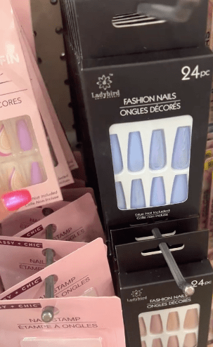 <p>Are you a fan of fake nails? Dollar Tree has something for you, too.</p><p>"Their nail game has been stepped up to the max. They've got some really pretty nails," Houser says while filming an aisle full of different press-on nail products.</p><p>Dollar Tree's collection at her store includes a pack that has a purple, pink, and white design with flowers and swirls, as well as a set of hot pink glow-in-the-dark nails.</p>