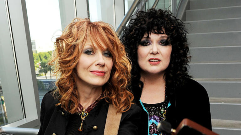 Musicians Nancy Wilson (L) and Ann Wilson of the rock band Heart pose at MusiCares' "An Evening with Heart" at The Grammy Museum on May 24, 2010 in Los Angeles, California