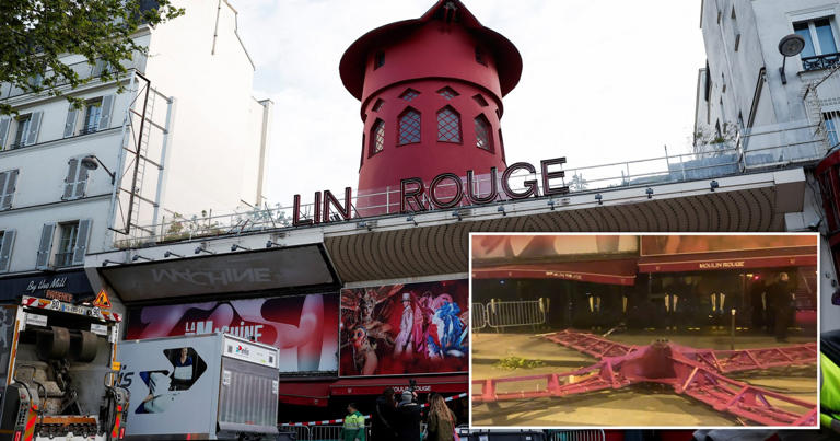 Sails of the landmark red windmill atop the Moulin Rouge on the ground (Picture: Reuters)