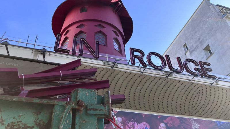 moulin rouge's iconic windmill sails collapse overnight