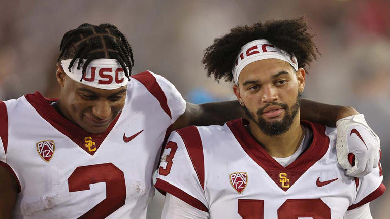 Brenden Rice, left, and Caleb Williams of the USC Trojans stand on the sideline during their game against the Cardinal on Sept. 10, 2022, in Stanford, California. Getty Images