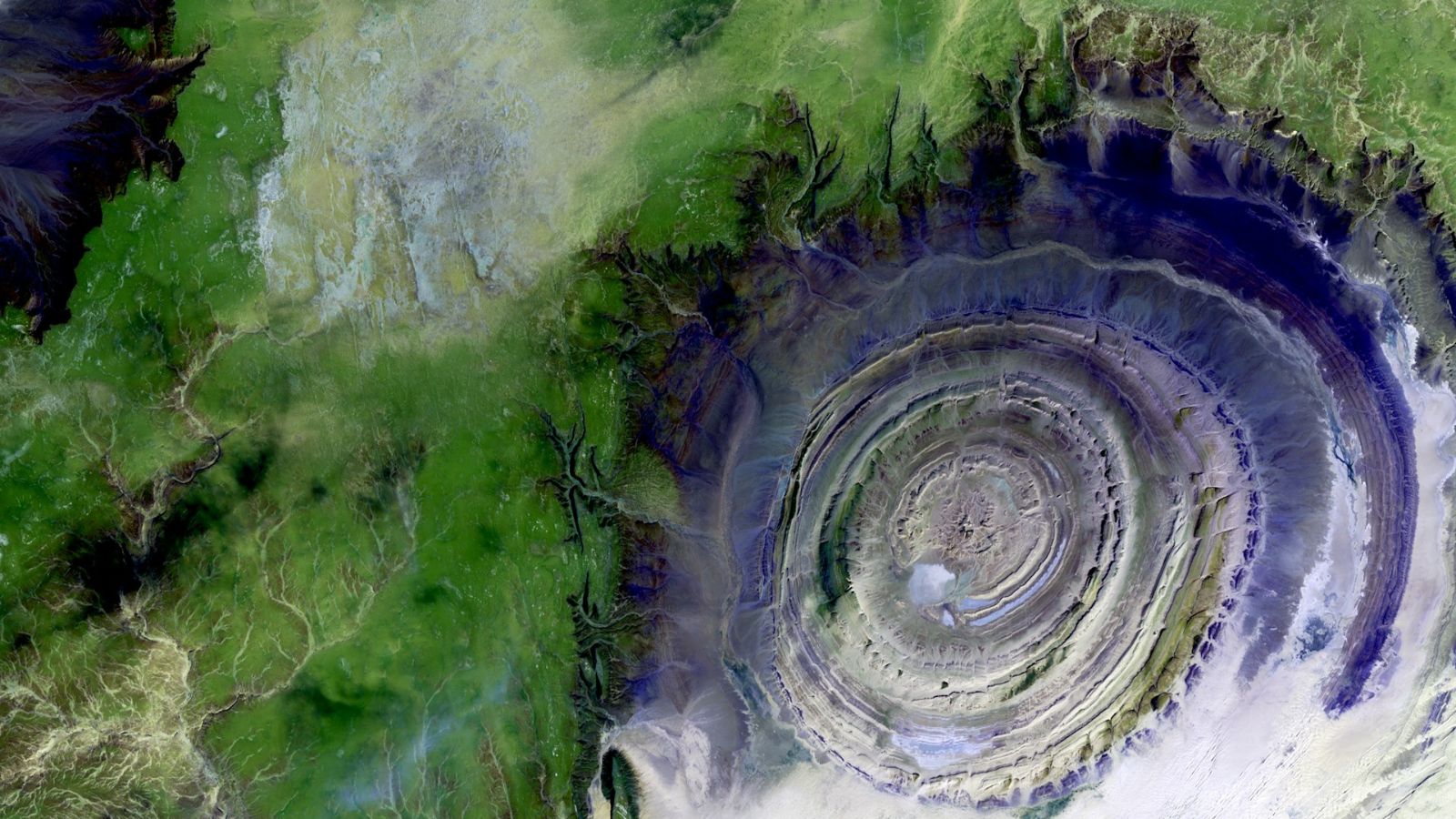 <p>Also known as the Eye of the Sahara, this prominent circular feature in the Sahara Desert has puzzled observers and given rise to various geological and conspiracy theories.</p>