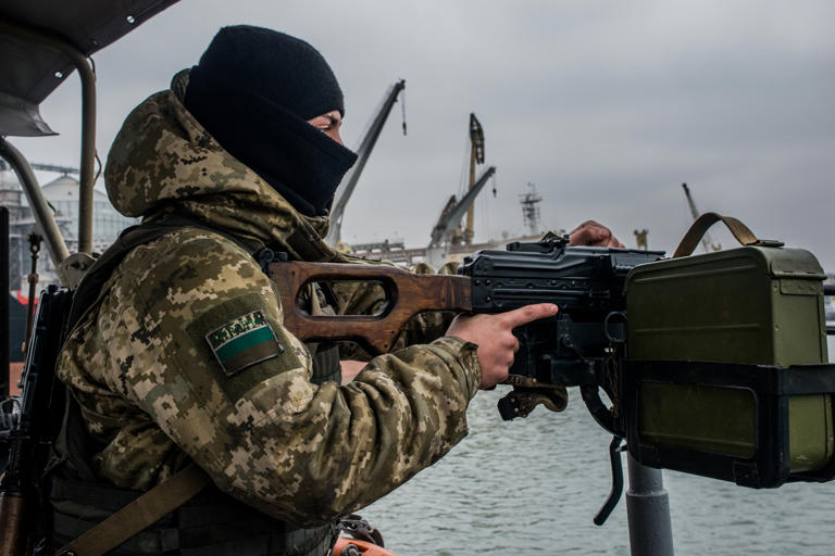 A Ukrainian sea border security force soldier mans the machine-gun of a vessel on the Azov Sea on November 28, 2018 in Mariupol, Ukraine. Russia has deployed three more cruise missile carriers to the Mediterranean Sea with a total of 20 missiles, the Ukrainian Navy said.   Martyn Aim/Getty Images)
