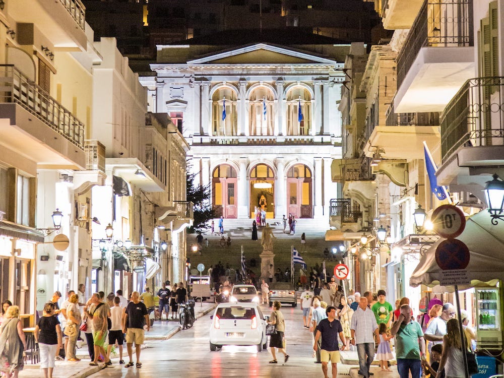 <p><span>One of Syros' most </span><a href="https://www.businessinsider.com/famous-landmarks-construction-2018-3"><span>prominent landmarks</span></a><span> is Miaouli Square, located just a few steps away from the harbor in the main city of Ermoupoli. </span></p><p><span>It's a great place to start exploring the island — people of all ages gather to chat and catch up, kids play, and teens socialize on the steps of the town hall.</span></p><p><span>I love sitting in one of the many cafés around the plaza, like Belle Époque, and enjoying pastries and Greek coffee while I watch the town go by.</span></p>