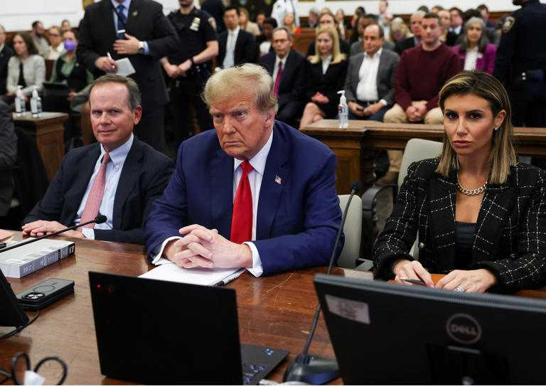 Former U.S. President Donald Trump and his lawyers Christopher Kise (left) and Alina Habba (right) attend the closing arguments in the Trump Organization civil fraud trial at New York State Supreme Court on January 11, 2024 in New York City. Kise will be unavailable will he undergoes and recovers from surgery, court papers said.