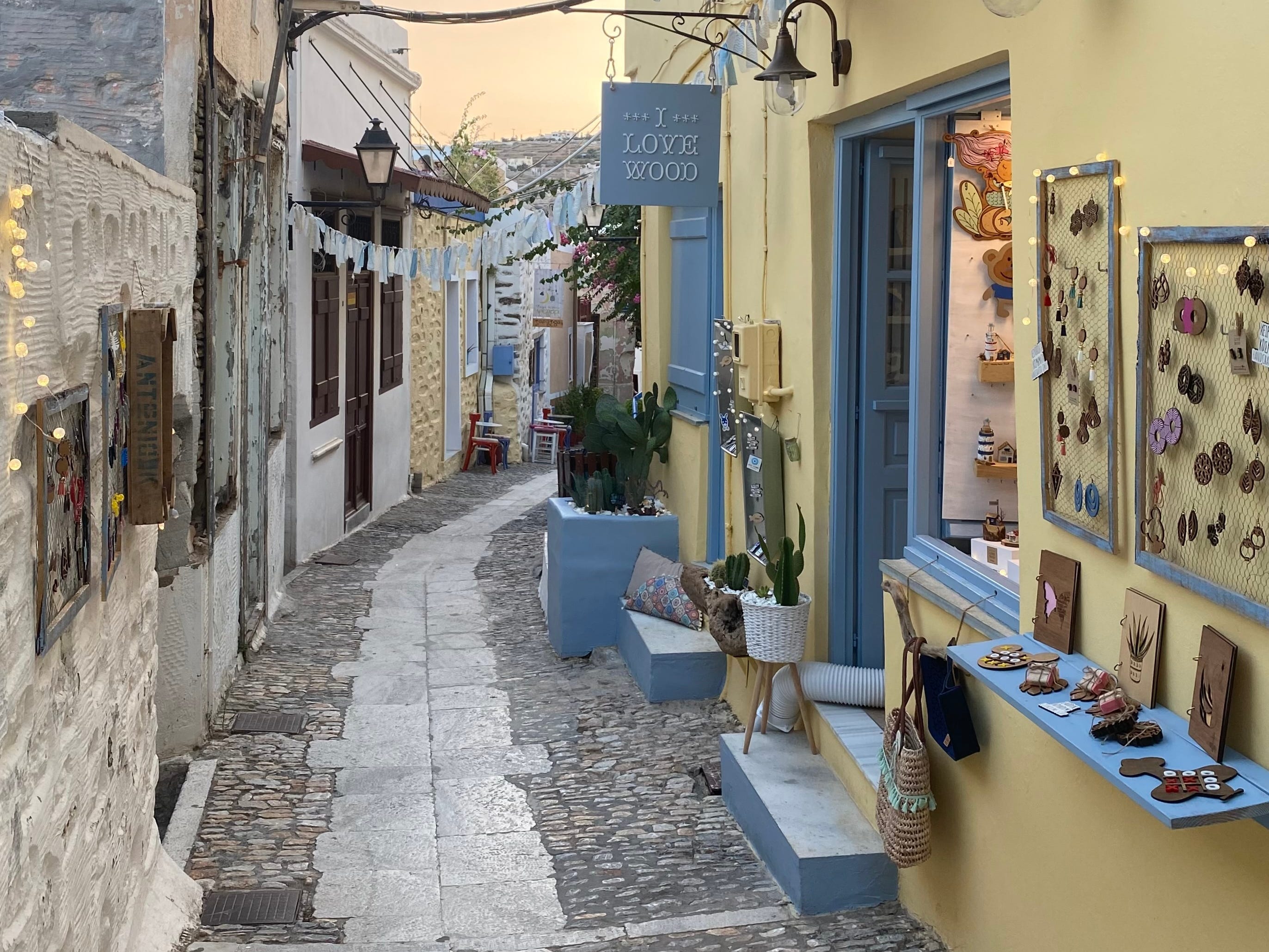 <p><span>If you can manage all the steps, walking uphill to Ano Syros from Ermoupoli is a treat. </span></p><p><span>You'll find a lot of craft, jewelry, clothing, and other shops, as well as cute cafés to explore in this part of the island.</span></p><p><span>Make sure to arrive in the morning or late afternoon as many stores close for a bit around midday.</span></p>