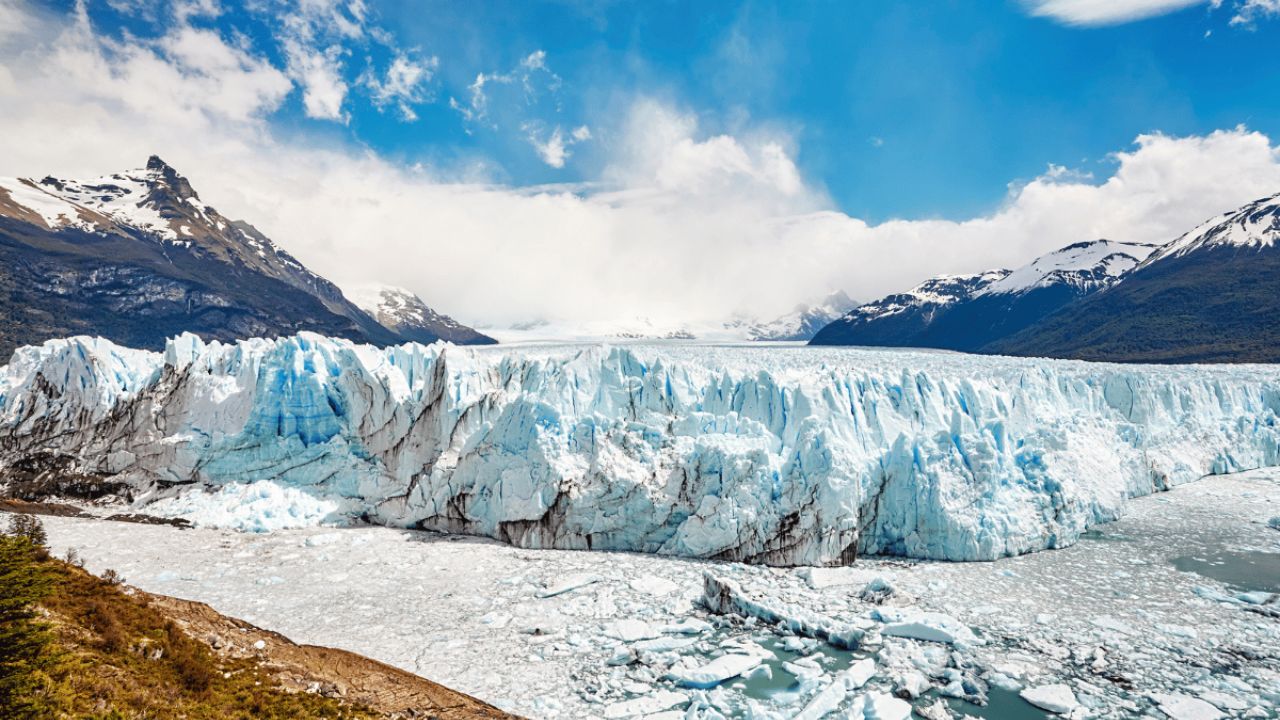 <p>Nestled within <a href="https://explorersaway.com/things-to-do-in-argentina/">Argentina</a>‘s Los Glaciares National Park, the Perito Moreno Glacier is one of the few glaciers in the world that is still advancing. Its massive ice field extends for over 250 square kilometers, creating towering ice walls. Visitors can witness the spectacle of ice calving, as massive chunks of ice break off and crash into the waters below, and even hike across the surface of the glacier, navigating amidst massive crevices.</p>