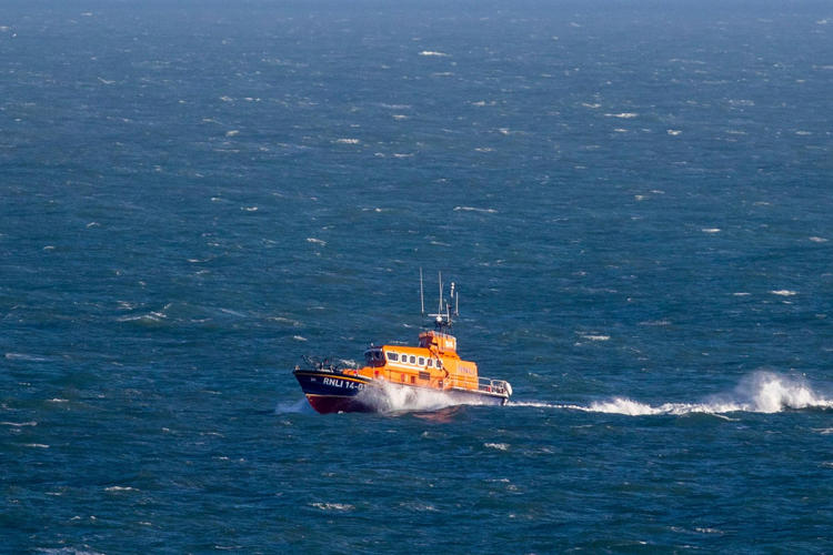 Three men rescued by coastguard after tanker and fishing boat collide at sea