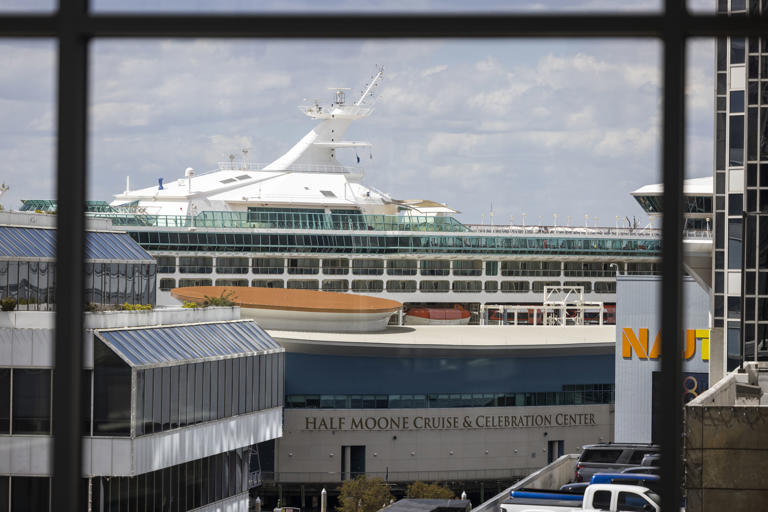 A cruise ship docked at the Half Moone Cruise and Celebration Center in downtown Norfolk is seen from inside Hilton Norfolk The Main on Friday, April 12, 2024.