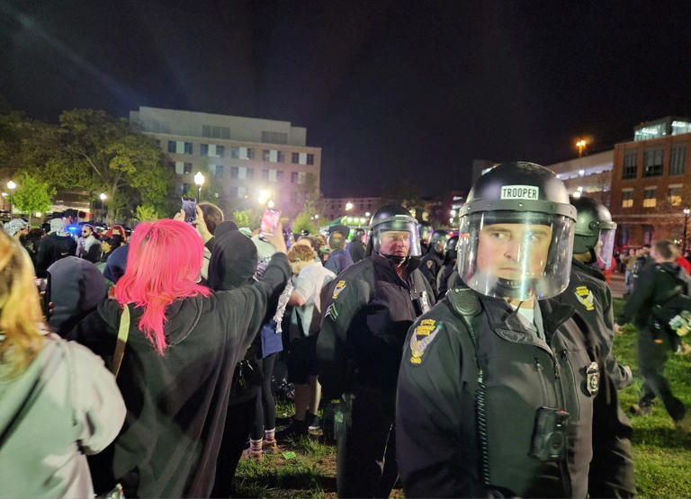 Police try to break up protests Thursday, April 25, 2024, at Ohio State University.