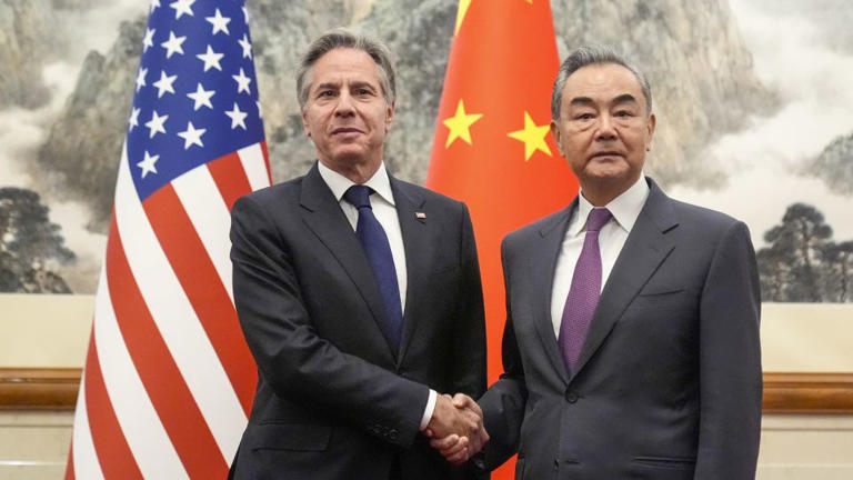 US Secretary of State Antony Blinken shakes hands with China's Foreign Minister Wang Yi in Beijing on April 26, 2024. - Mark Schiefelbein/Pool/AFP/Getty Images