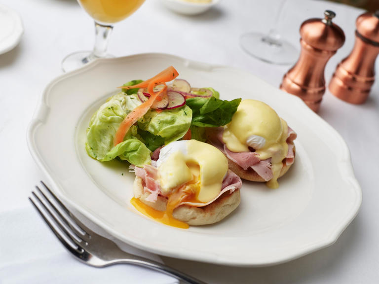 Eggs Benedict featuring Berkshire ham on a toasted English muffin with poached eggs and hollandaise sauce is on the Mother's Day menu at Lake Park Bistro.