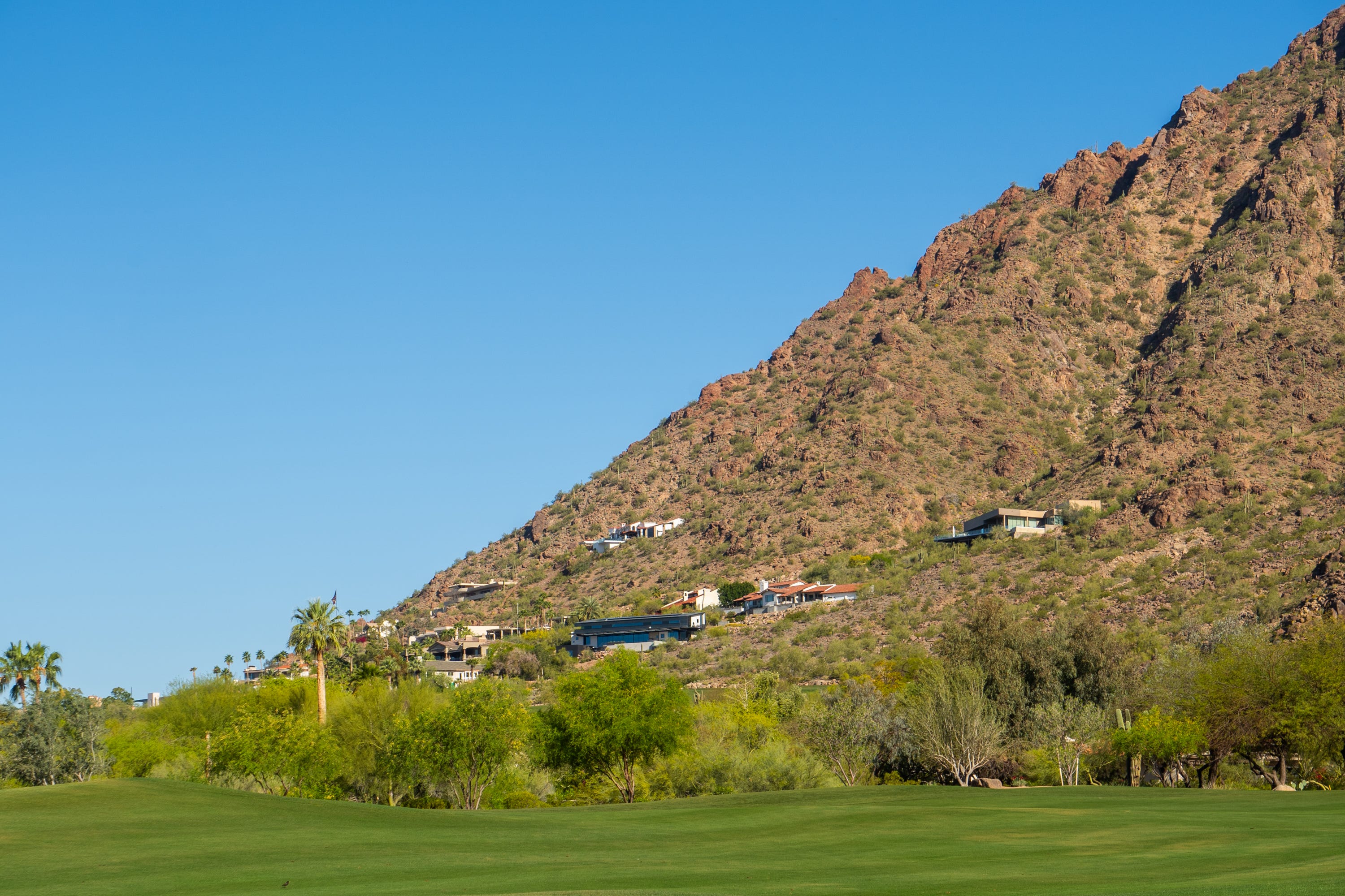 <p>We can't talk about Scottsdale without talking about Paradise Valley.</p><p>Known as the "<a href="https://www.businessinsider.com/paradise-valley-arizona-wealthy-californians-moving-privacy-luxury-lower-taxes-2024-2">Beverley Hills of Arizona</a>," the town between Phoenix and Scottsdale is home to mostly gated estates along Camelback Mountain and Mummy Mountain.</p><p>As Business Insider previously reported, it's the richest municipality in the state. The median home listing price is $5.5 million, and the most expensive on the market is $75 million, <a href="https://www.realtor.com/realestateandhomes-search/Paradise-Valley_AZ/overview">according to Realtor.com</a>.</p>