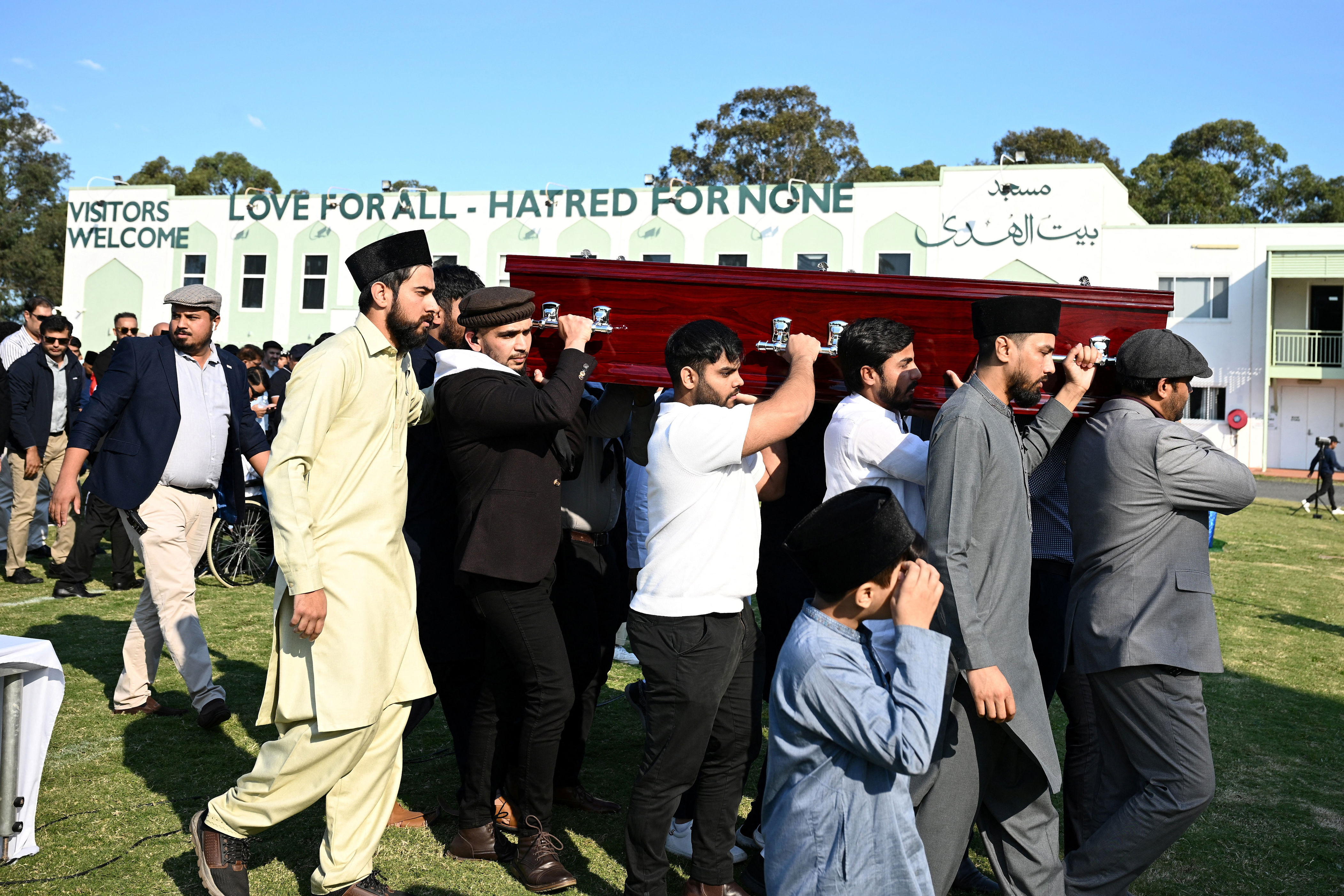 australia was ‘lucky to have’ pakistani refugee guard who died in sydney stabbing, says pm