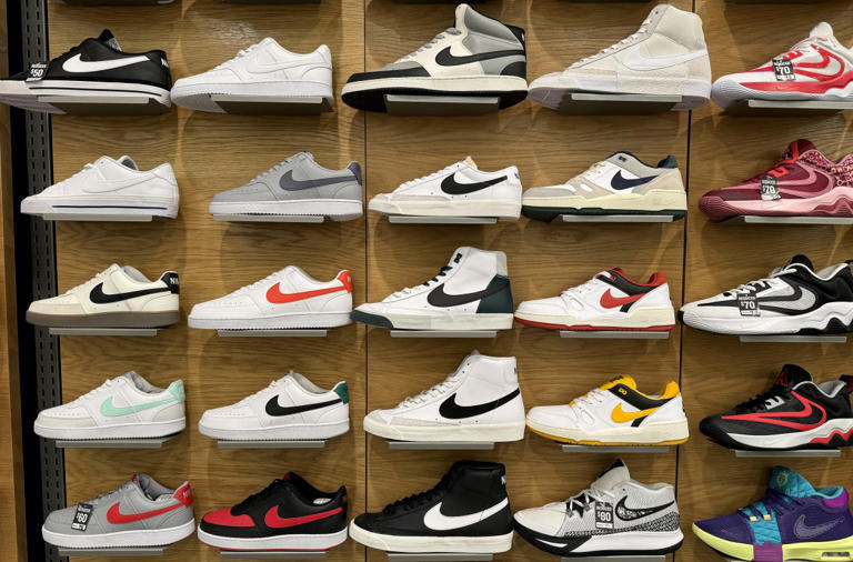 Nike shoes are displayed at a Macy's store.
