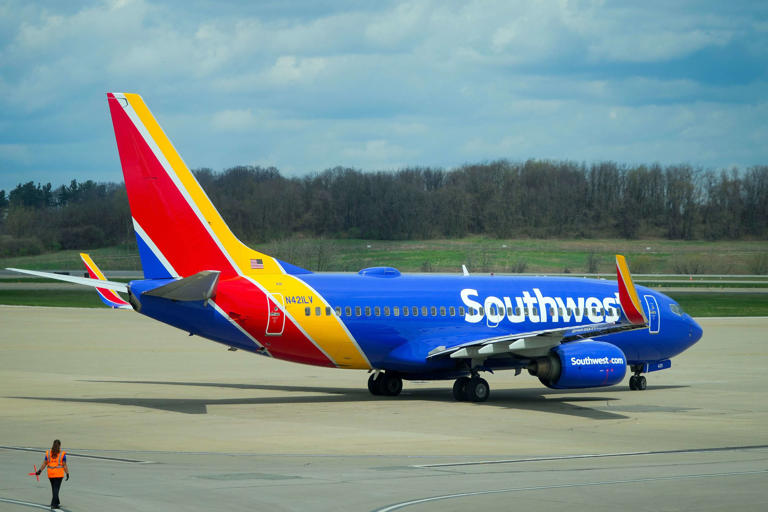 A Southwest Airlines flight pushes back from the gates at Pittsburgh International Airport on Tuesday, April 9, 2024.