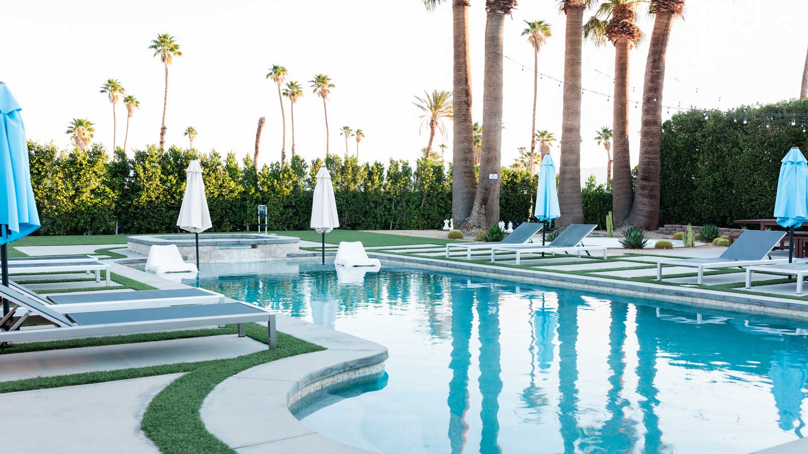 <p><span>200 W Arenas Rd, Palm Springs, CA 92262</span></p><p><span>We booked our romantic anniversary stay at the </span><a href="https://holidayhouseps.com/" rel="nofollow noopener"><span>Holiday House</span></a><span>. This blue and white-painted adults-only boutique hotel is in the heart of Palm Springs and is absolute perfection for those who love artistry, luxury, and quiet. From the warm smiles of the staff and the fabulous pool and grounds to the exceptional rooms with the highest quality bedding, furniture, and amenities, this is where you want to stay. </span></p><p><span>Each day, we started with the most delicious, healthy breakfast served a la carte from the bar/lounge area. Guests can choose from fresh fruit, yogurt and chia pudding, bagels and lox, cereals, toasts, hard-boiled eggs, and so much more. Their lunch and dinner menus comprised a more focused selection of nutritious yet fun choices, such as a bucket of veggies, grilled artichokes, and lobster rolls.</span></p><p><span>Guests can rent bicycles to explore the town, play bocce ball, or soak up the sun while lounging around the newly remodeled pool area. Remember to cool off with some ice cream from the retro cart that is available, too. </span></p>
