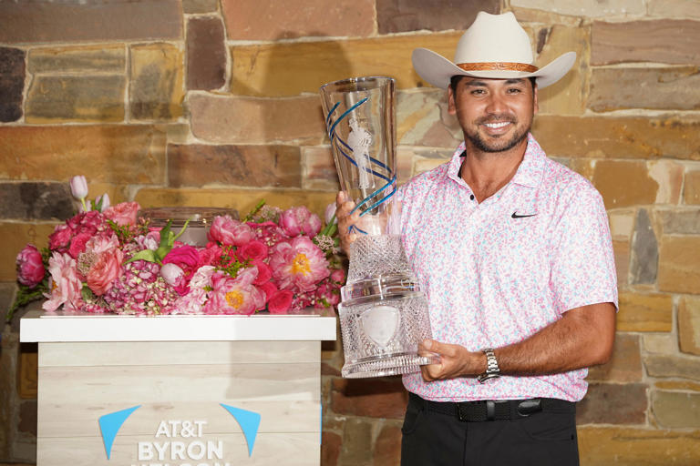 Jason Day poses with the winner's trophy during the final round of the AT&T Byron Nelson golf tournament. Mandatory Credit: Raymond Carlin III-USA TODAY Sports